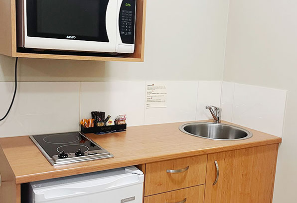 Queen + Single Self Contained Motel Room